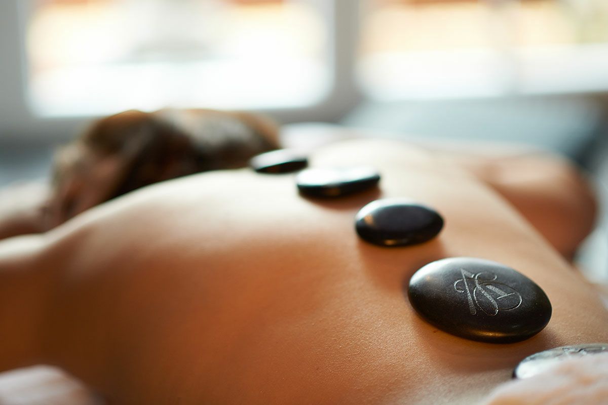 Atmosphere - Hot Stone oder andere Massage Classic 90 Minuten